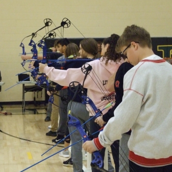 Students doing archery