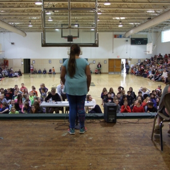 Photo of student on stage