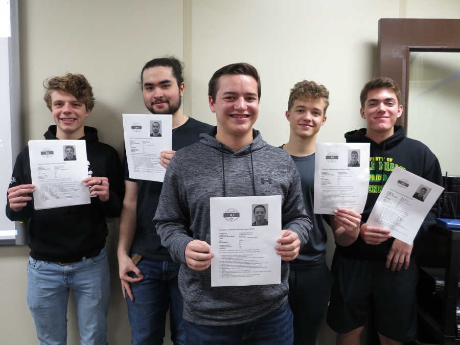 Photo of students holding certificates Photo of students holding certificates