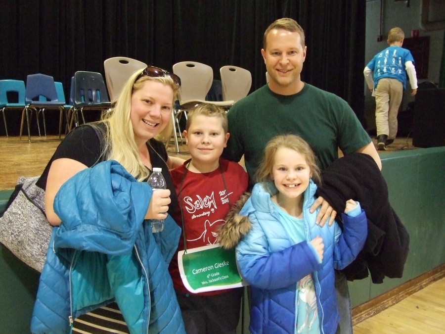 Photo of student with his family