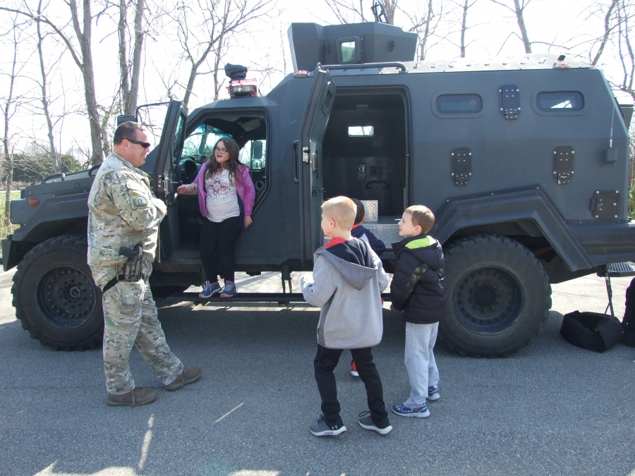 Photo of students in vehicle