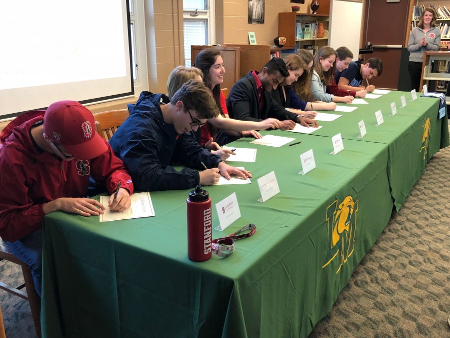 Photo of students signing