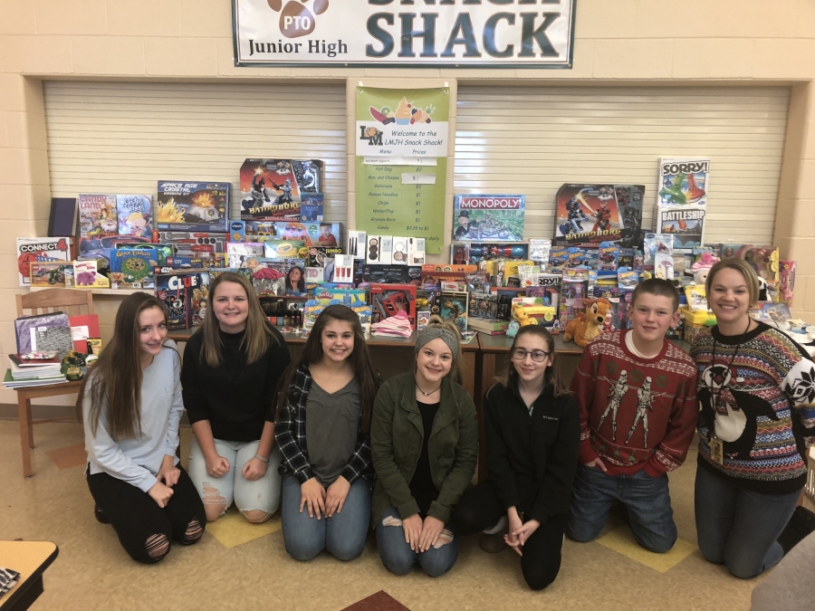 Photo of students with toys