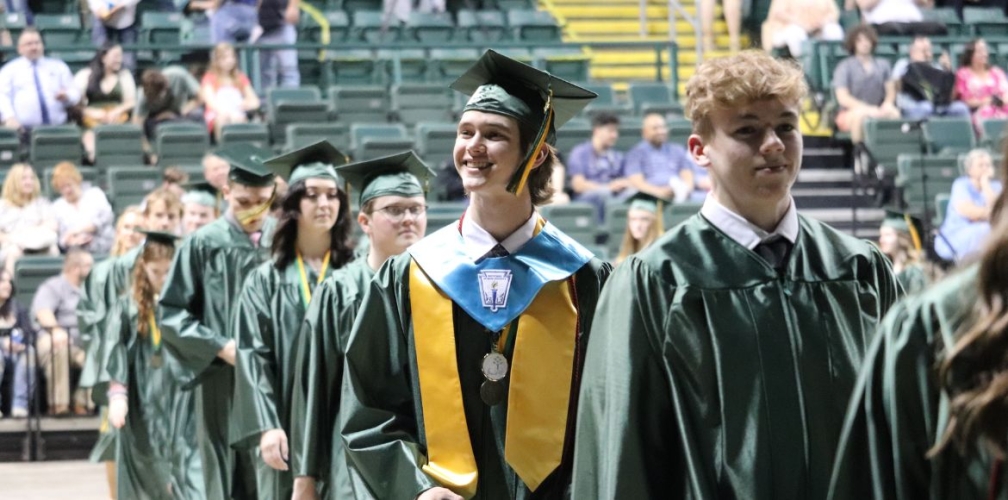 graduates smiling